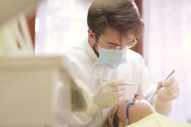 Dentist in Los Algodones; dentist with a patient