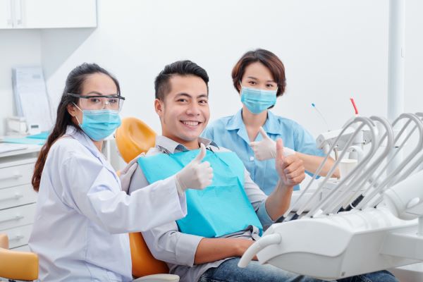 Dentists in Los Algodones; two dentists with her patient