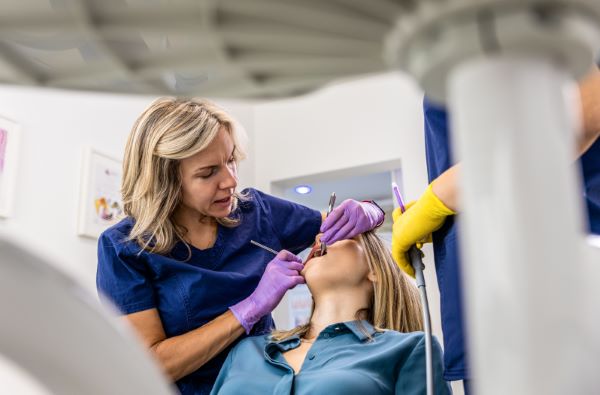 How to find a good dentist in Mexico; female doctor checking carefully